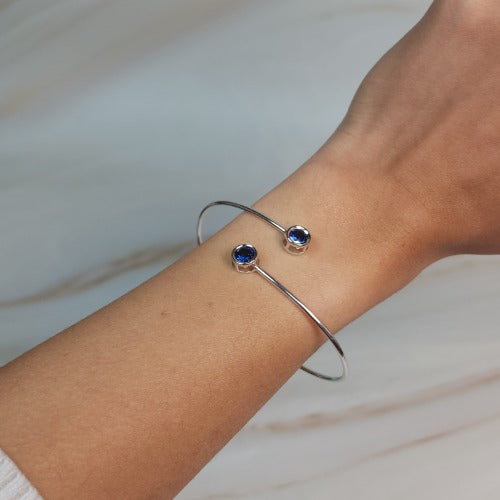 14Kt Gold Blue Sapphire Round Bezel Bangle Bracelet