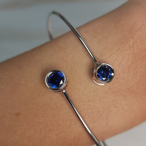 14Kt Gold Blue Sapphire Round Bezel Bangle Bracelet
