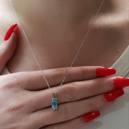14Kt Gold Blue Topaz Marquise Pendant