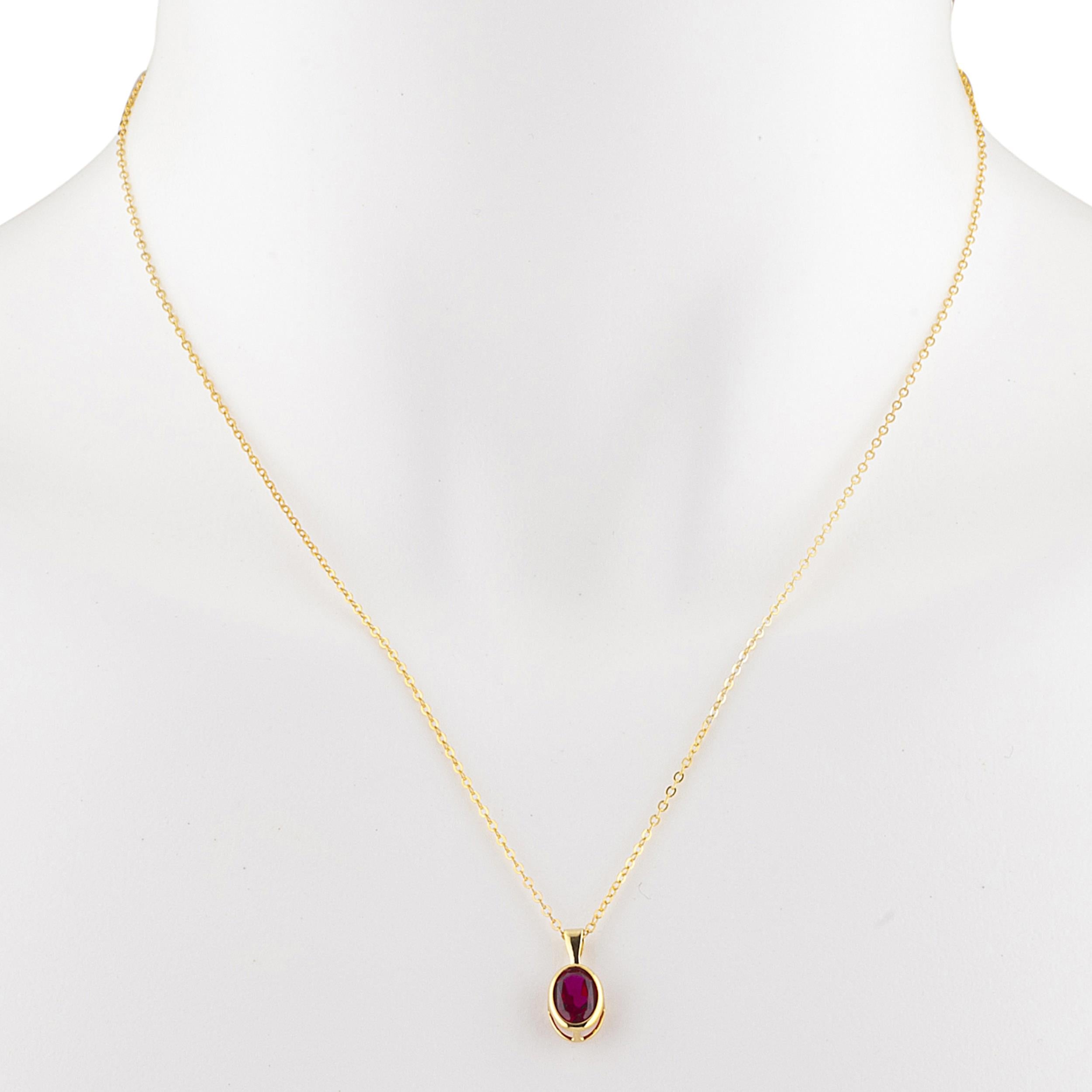 14Kt Gold Created Ruby Oval Bezel Pendant Necklace