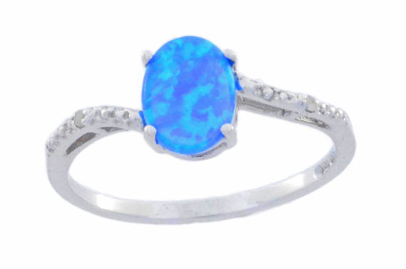 14Kt White Gold Blue Opal & Diamond Oval Ring