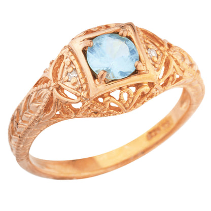 14Kt Gold Blue Topaz & Diamond Design Round Ring