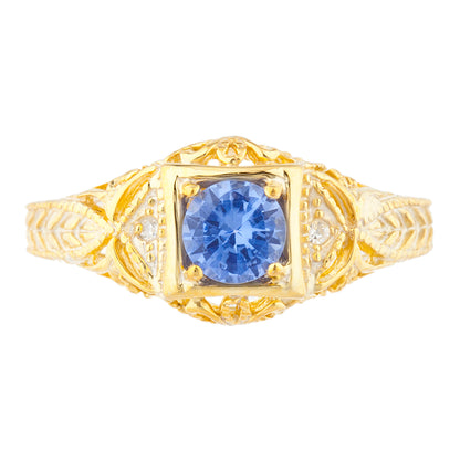 14Kt Gold Tanzanite & Diamond Design Round Ring