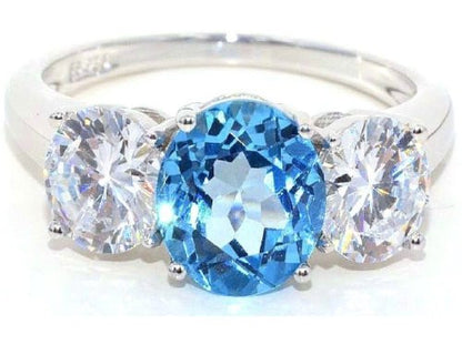 4 Ct Blue Topaz & Zirconia Round Ring .925 Sterling Silver Rhodium Finish