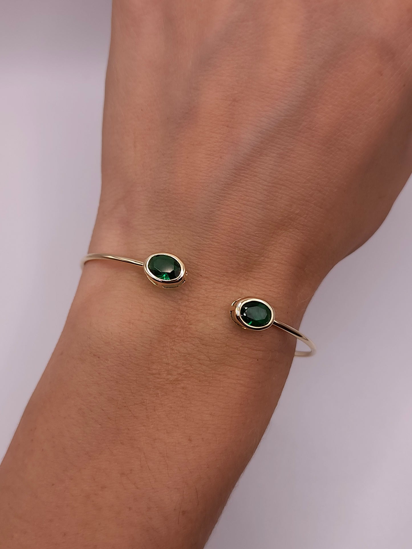 14Kt Gold Emerald Oval Bezel Bangle Bracelet