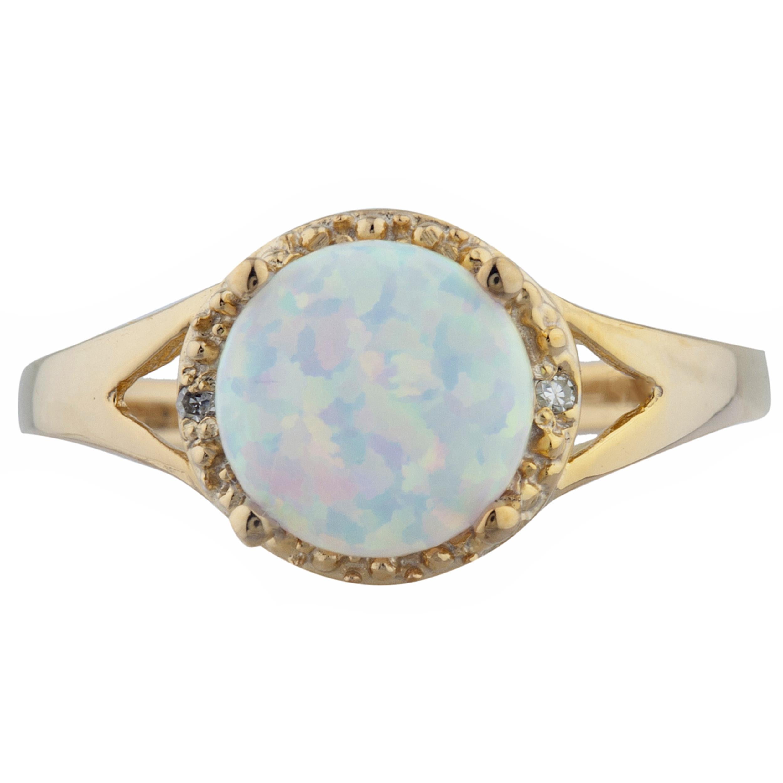 14Kt Gold Opal & Diamond Halo Design Round Ring