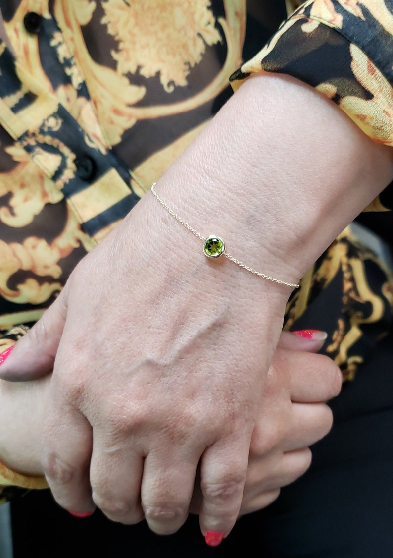 14Kt Gold Peridot Round Bezel Bracelet