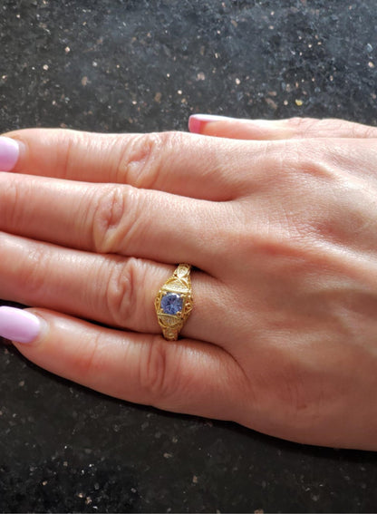 14Kt Gold Tanzanite & Diamond Design Round Ring