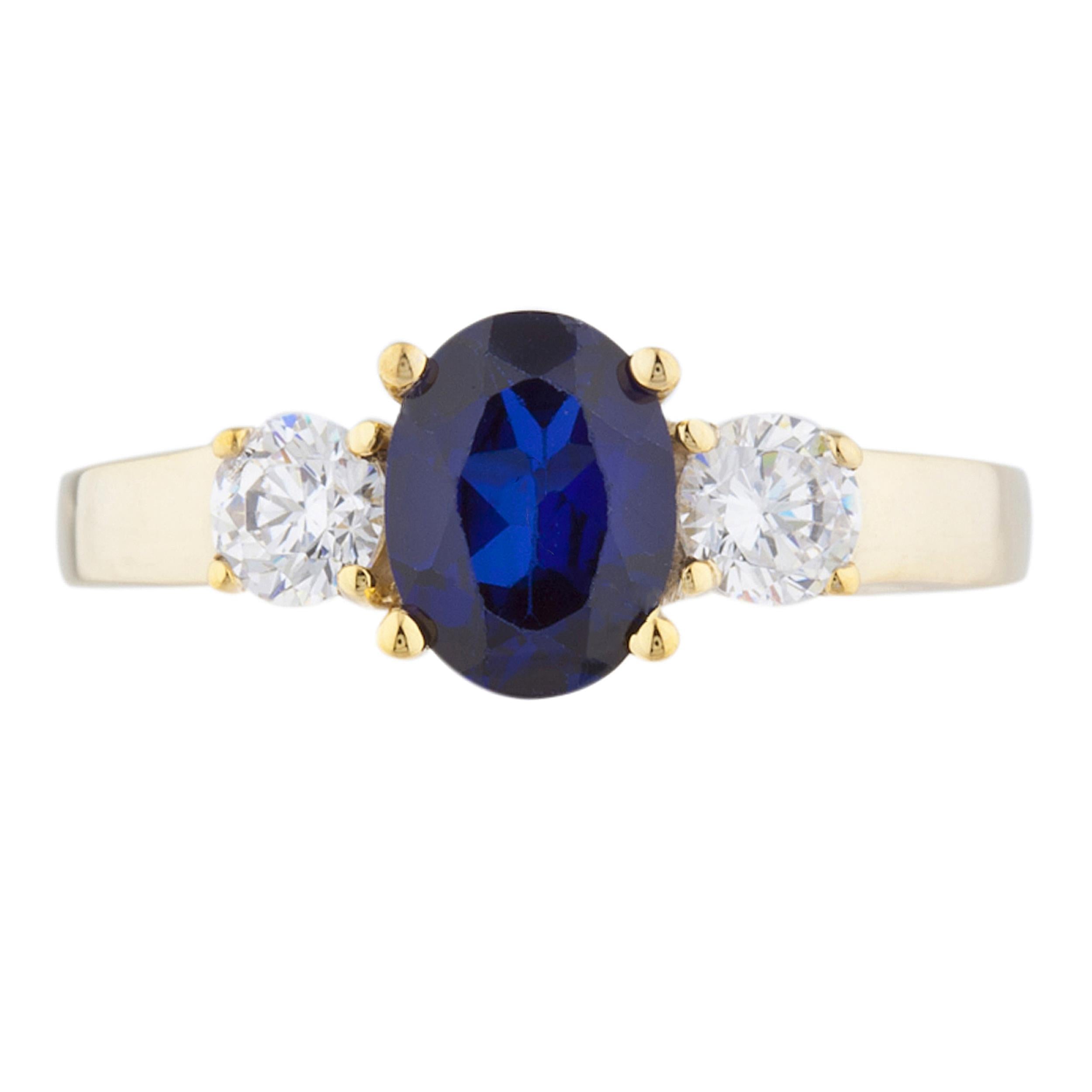 14Kt Gold 2 Ct Blue Sapphire & Zirconia Oval Ring
