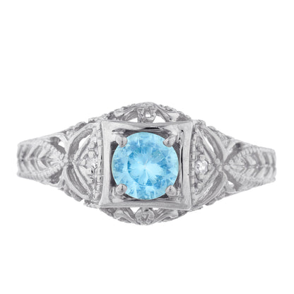 14Kt Gold Blue Topaz & Diamond Design Round Ring