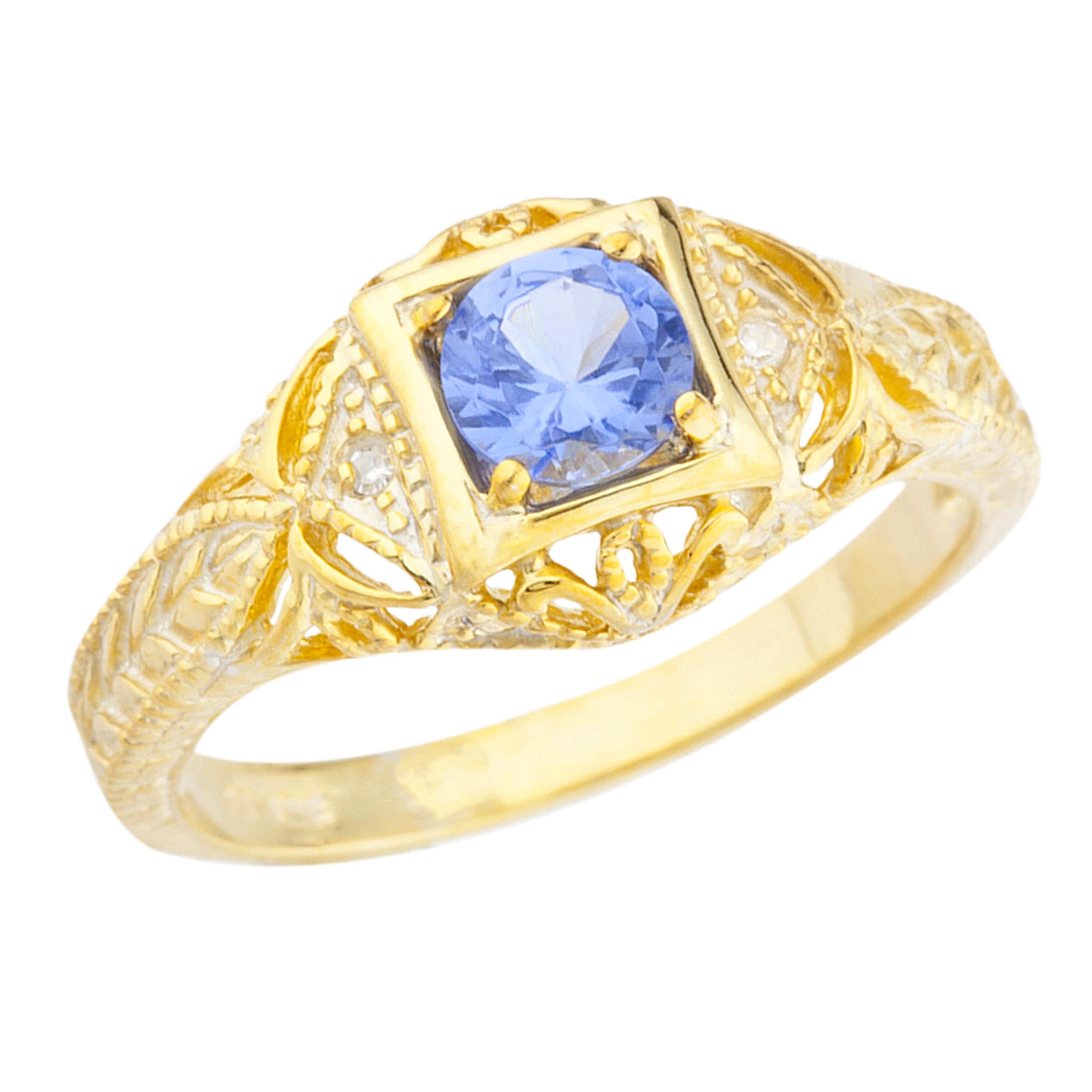 14Kt Gold Tanzanite & Diamond Design Round Ring