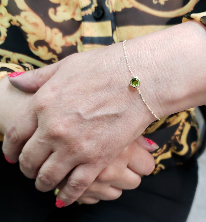 14Kt Gold Peridot Round Bezel Bracelet