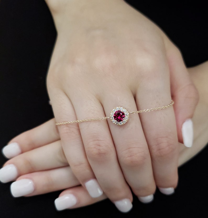 14Kt Gold Ruby Halo Round Bracelet