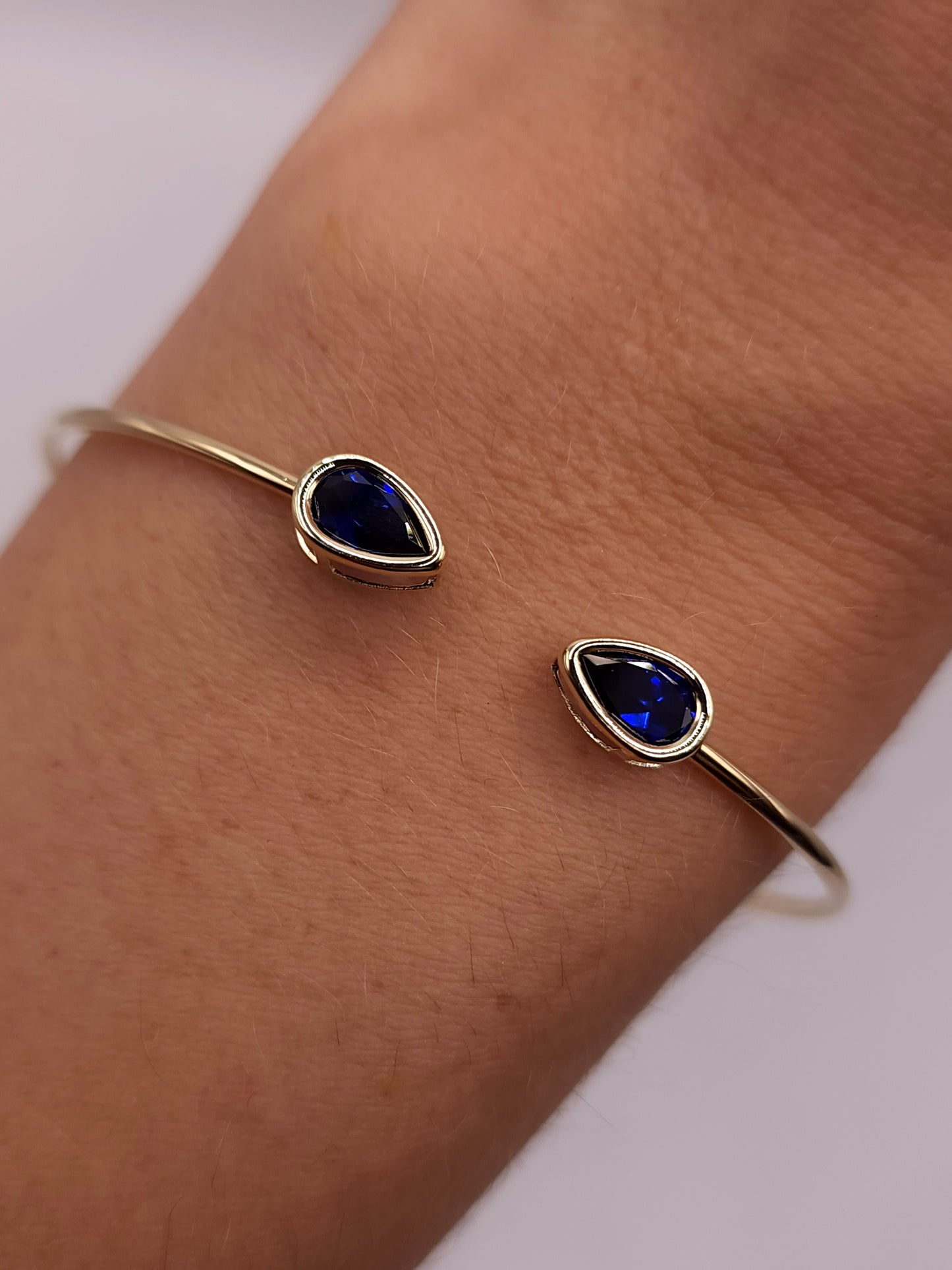 14Kt Gold Blue Sapphire Pear Bezel Bangle Bracelet