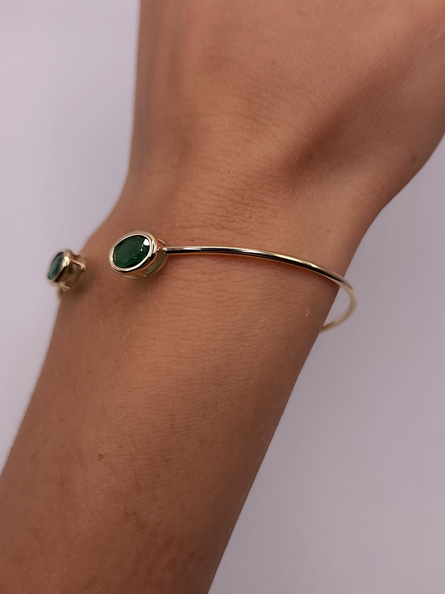 14Kt Gold Emerald Oval Bezel Bangle Bracelet