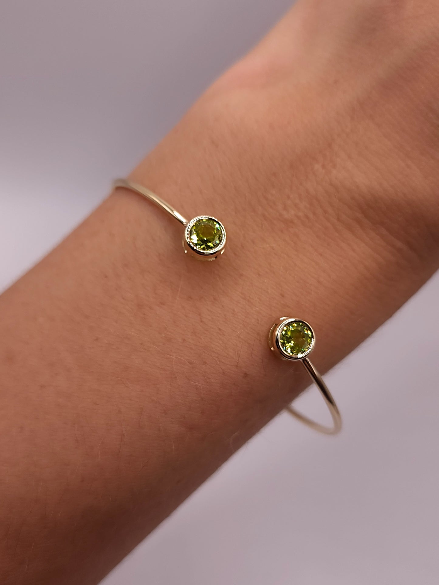 14Kt Gold Peridot Round Bezel Bangle Bracelet